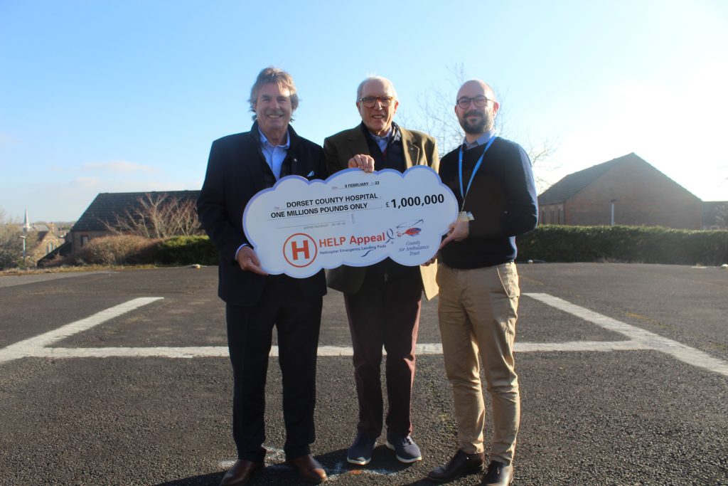 Helipad (just Nick) Our Chief Exec with members of the HELP Appeal and a giant cheque